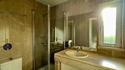 a bathroom with a sink and a shower at Ellegance by Check-in Portugal in Vilamoura