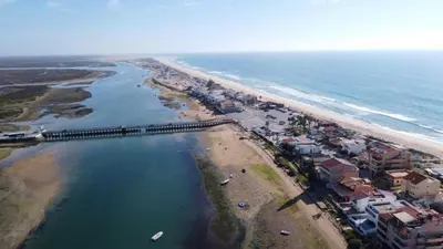 an aerial view of a beach and the ocean at Ria Beach Studio in Faro