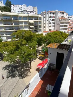 an overhead view of a building with trees and buildings at Plage in Albufeira