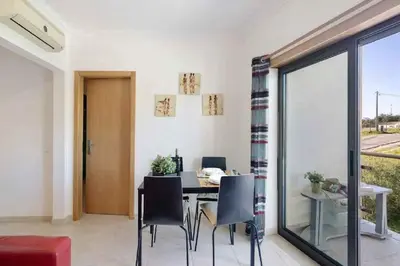 a bathroom with a sink and a toilet and a shower at AP Casa Monte da Balaia in Albufeira