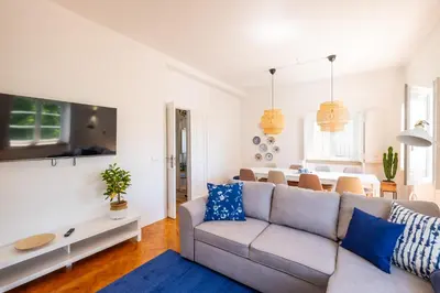 a living room with a couch and a table at #049 Villa Lemon by Home Holidays in Albufeira