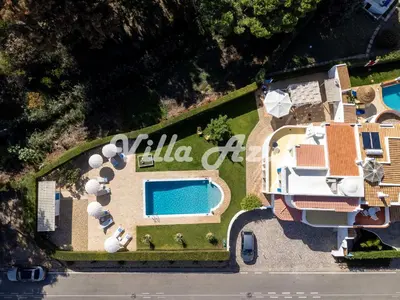 an aerial view of a villa with a swimming pool at Elegant villa with private pool in Quarteira in Vilamoura