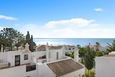 a view of the ocean from the roof of a house at Casa Estrela do Mar in Vale do Lobo