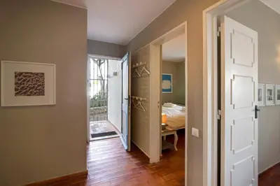 a hallway with a door leading to a bedroom at Villa Apple in Vale do Lobo