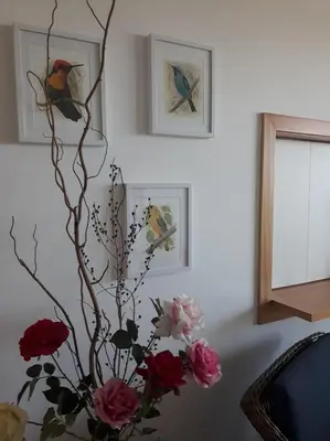 a vase filled with roses in a room at Residence Golf Club-Vilamoura-Algarve in Vilamoura
