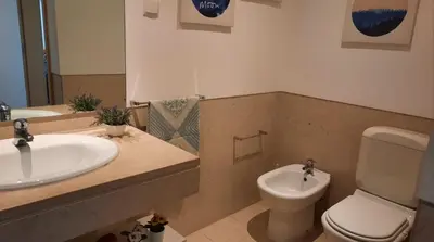 a bathroom with a sink and a toilet at Residence Golf Club-Vilamoura-Algarve in Vilamoura