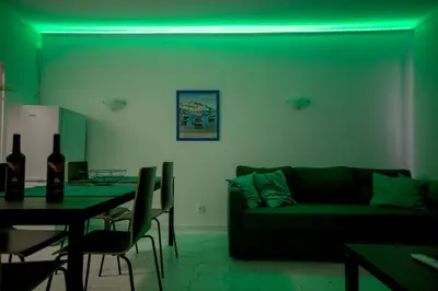a living room with a couch and a table at Sea View Apartment - 3 Swimming Pool & Fitness in Albufeira