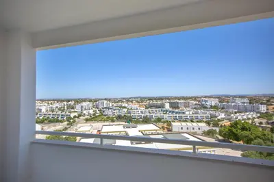a view from the balcony of a building at Sea View Apartment - 3 Swimming Pool & Fitness in Albufeira