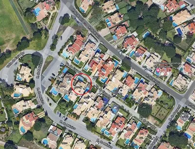 a map of a city with houses and a red circle at Vila Sophia, Vilamoura- By Urbinvest Algarve in Vilamoura