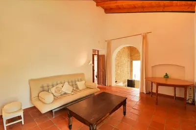 a living room with a couch and a table at Villa 3 Quartos, Piscina, AC, Vista Mar, Prestige For Home in Loulé