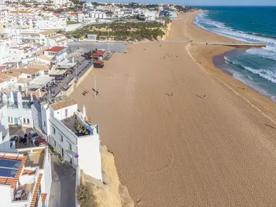 an aerial view of a beach in positano at Casa da Bateria by HelloVacations in Albufeira