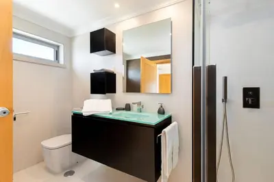 a bathroom with a sink and a mirror at Varandas do Castelo By Garvetur in Albufeira
