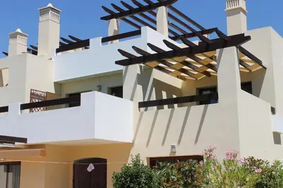 a house with stairs in front of it at Algarve Paraíso / Golf Vila Sól in Quarteira