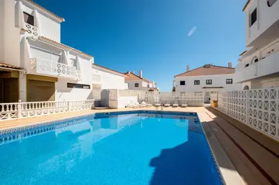 a bedroom with a bed in a room at #035 T2 Oura Village by Home Holidays in Albufeira
