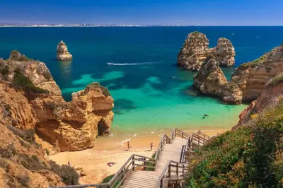 a view of the ocean from a rocky mountain at AlbufeiraOrada BlueSky by Be Cherish in Albufeira