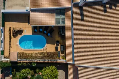 an aerial view of a house with a swimming pool at Sunny 2BDR House W/ Private Pool by LovelyStay in Albufeira