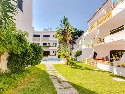 a walkway in front of a building at AL - Apartamento Sunrise, Sol Nascente 1 Ground floor in Vilamoura