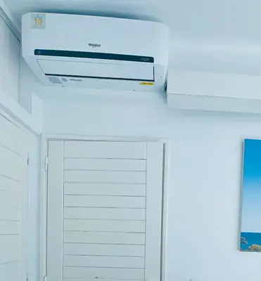 a kitchen with a stove and a white ceiling at Ocean View Skyline Apartment ‚Hakuna Matata‘ in Albufeira