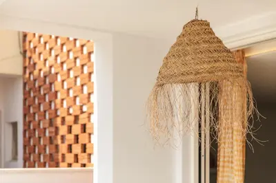 a hanging basket chandelier in front of a door at Casa do Pátio-Two Private Pools Villa- Rooftop & Panoramic Pool by DreamvillasAlbufeira in Albufeira