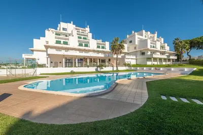 an aerial view of a resort near the ocean at #071 Maria Luisa by Home Holidays in Albufeira
