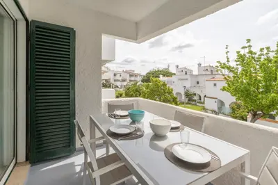 a bathroom with a sink and a toilet and a shower at Centralgarve - Amazing Apt in the Heart of Vilamoura in Vilamoura