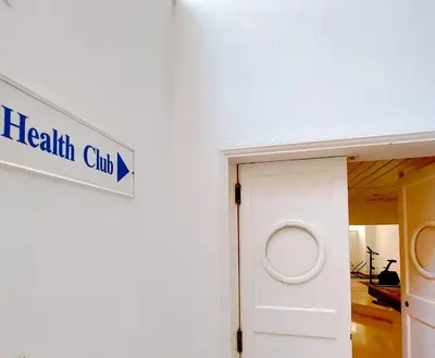 a health club sign on a wall next to a door at Marina Mar Sea Breeze by SAPvillas in Vilamoura