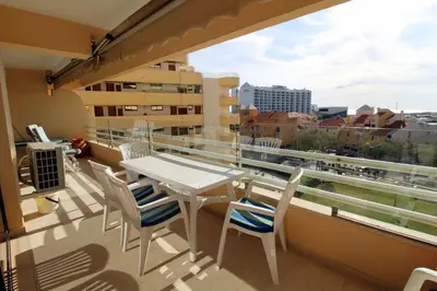 a balcony with a table and chairs and a view at Marina Mar Sailor by SAPvillas in Vilamoura