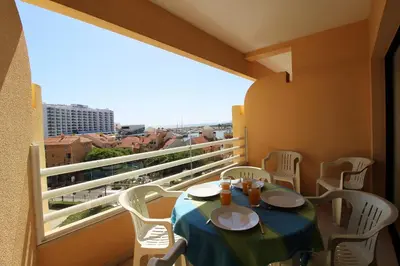 a table and chairs on a balcony with a view at Marina Mar Marina by SAPvillas in Vilamoura
