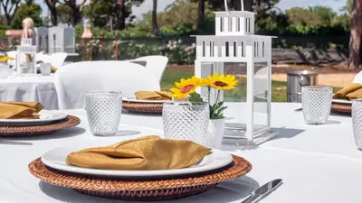 a white table with plates and napkins on it at Dream Villa with Luxury Services - PROMOTION Last dates! in Vilamoura