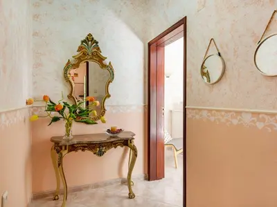 a dressing room with a table and a mirror at Holiday Home Isaurinda by Interhome in Faro