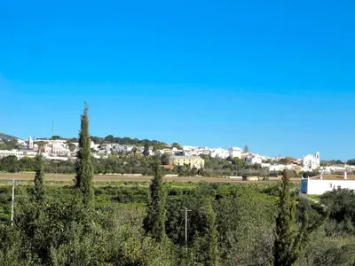 a view of a town from a field with trees at Holiday Home Isaurinda by Interhome in Faro