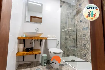 a bathroom with a toilet and a sink and a shower at #064 Families Only - Oh Live by Home Holidays in Albufeira