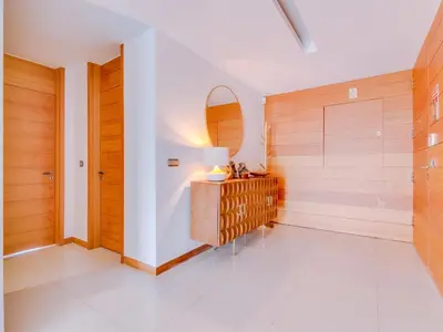 a bathroom with two sinks and a tub and a toilet at Vale do lobo, 'Golf by the Pool' 2 bedroom apartment in Vale do Lobo