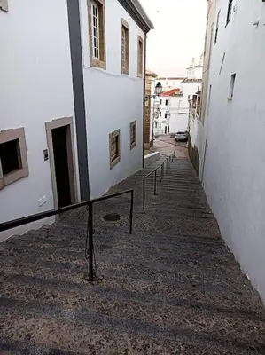 an alley with a stairway between two buildings at Sea & Sun OldTown in Albufeira