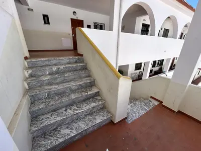 a staircase in a building with a stair case at Sta. Eulalia Mar A36 in Albufeira