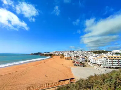 a view of a beach with buildings and the ocean at AlbufeiraOrada Gem by Be Cherish in Albufeira