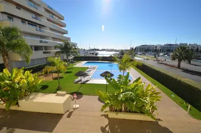 an overhead view of a swimming pool in a building at Marina Vilamoura - Aquamar 217 - By Vilamoura Sun in Quarteira