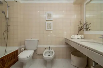 a bathroom counter with a sink and a mirror at Apartment Salgados Lounge - By Dalma Portuguesa in Albufeira