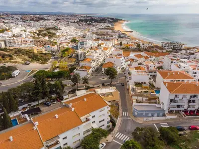 an aerial view of a city and the ocean at Casa Santa Maria - Sea View - 500m from the Beach - WiFi in Albufeira