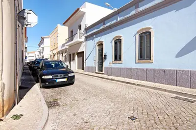 a car parked on the side of a street at Casa Loulé in Loulé