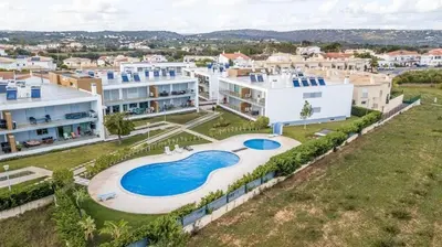 an aerial view of a large apartment complex with a swimming pool at Casa Jaffa in Albufeira