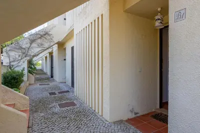 an empty hallway of a building with at Gorgeous 2BDR Apartment W/Patio & Pool by LovelyStay in Vilamoura