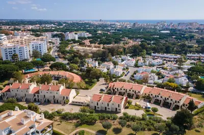 an aerial view of a city with buildings at Gorgeous 2BDR Apartment W/Patio & Pool by LovelyStay in Vilamoura