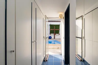 a hallway with a view of a pool from a house at Villa Vitry by Intiholidays in Albufeira
