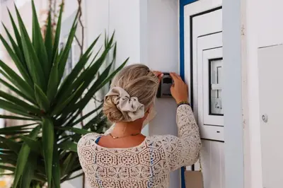 a woman with a flower mask on her head at Old Fisherman's Corner 16 - Centro Old Town Albufeira in Albufeira