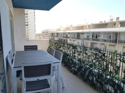 a table and chairs on the balcony of a building at T1 BOAVISTA 6 VISTA MAR Wi-Fi Ar Cond in Quarteira