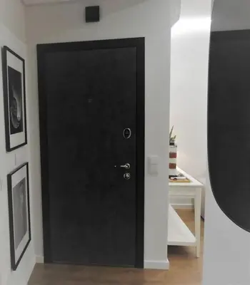 a white bathroom with a sink and a mirror at Black&light in Faro in Faro