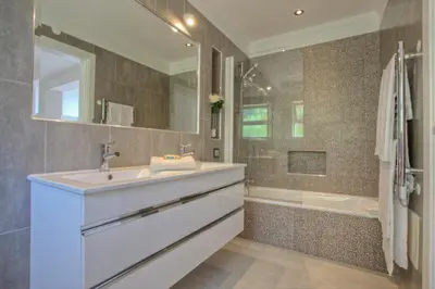 a bathroom with a sink and a bath tub at Casa da Horta in Almancil