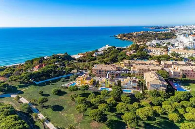 an aerial view of a house and the ocean at Villa Quinta dos Bicos by Villa Plus in Albufeira