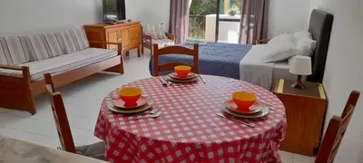 a room with a table with two cups on it at CASA IRINA Centro Cidade Albufeira in Albufeira